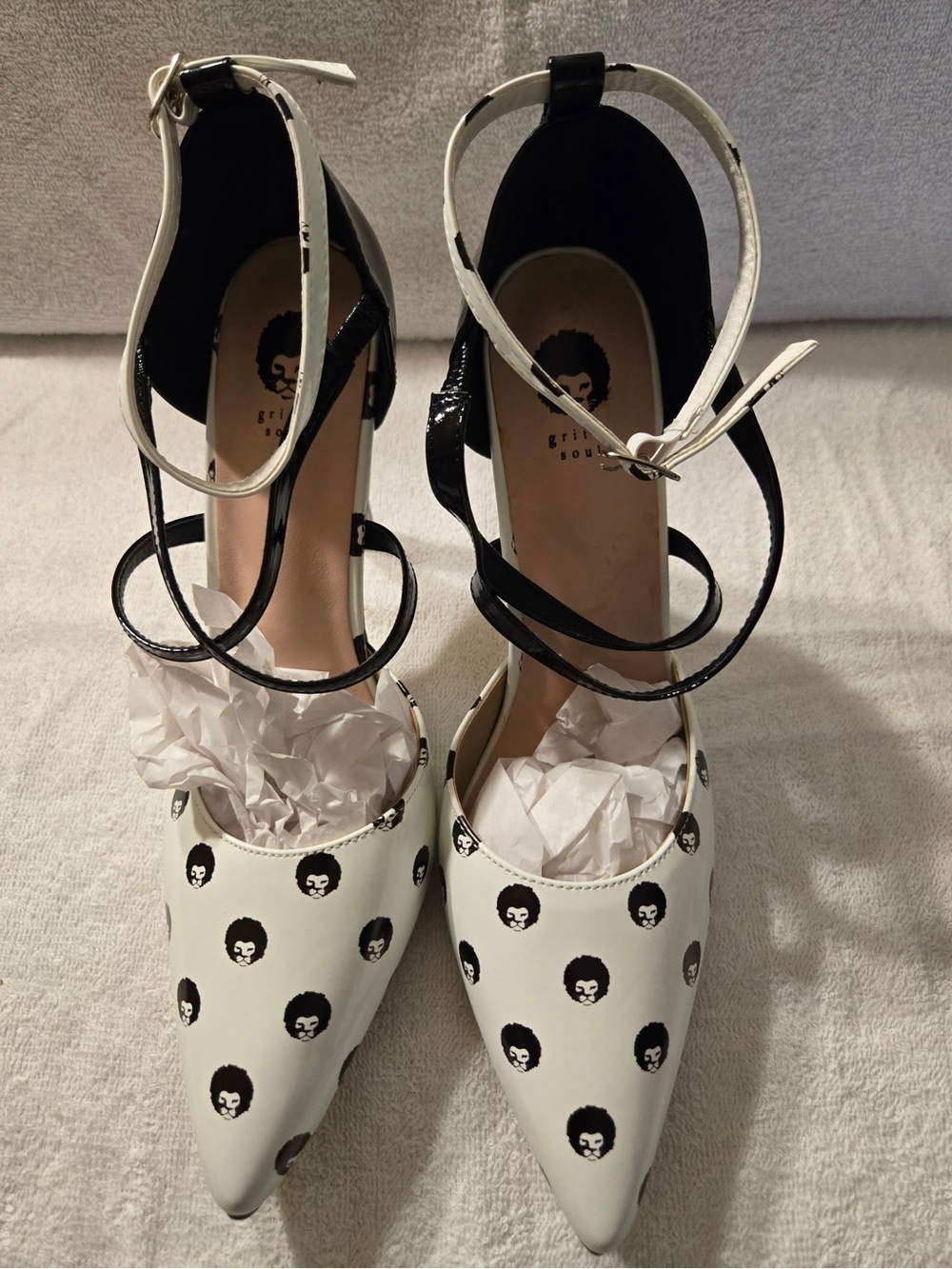 White Pointed Ankle-Strap Heels with Black Graphic Detail